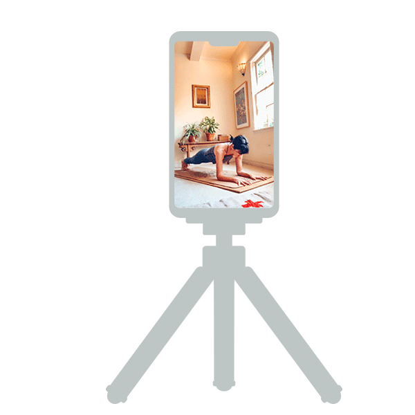 woman in plank pose while doing yoga-at-home